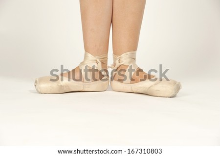 Ballet shoes on a white isolated background.