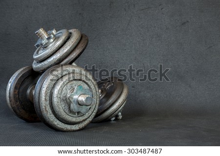 Exercise hand weights isolated on a black background
