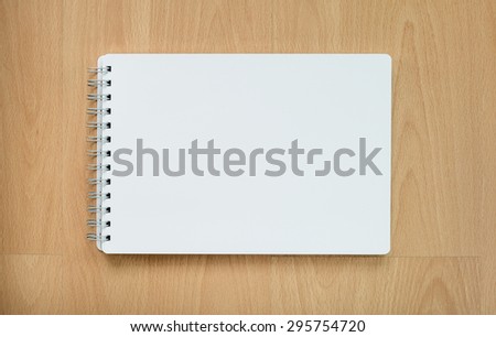 Note book on wood table, Sketch book on wood table, White paper on wood table