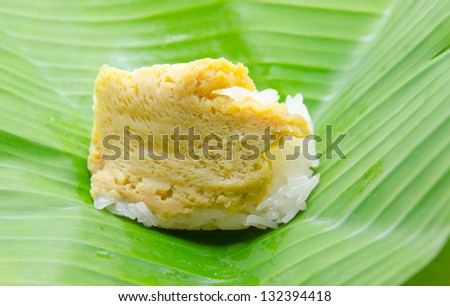 Thai dessert, Sticky rice with steamed custard, wrapped in banana leaf