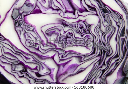 sliced of red cabbage isolated on white