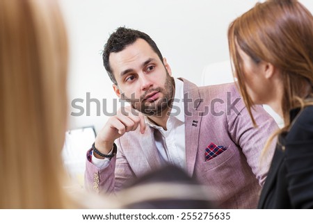 Talking at office. Man having conversation at business meeting.