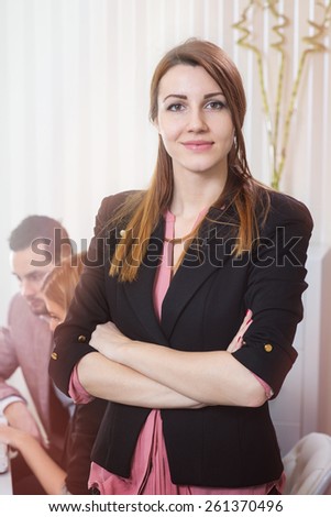 Corporate portrait of beautiful business woman at office.