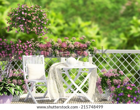 Open terrace with white furniture and flowers