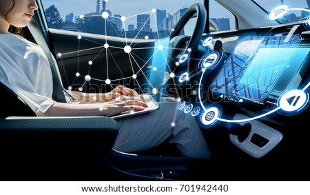 young woman riding autonomous car. self driving vehicle.