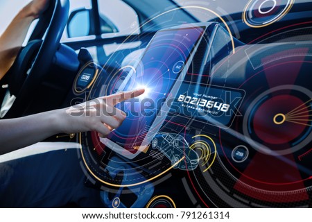Futuristic car cockpit and touch screen. Autonomous car. Driverless vehicle. HUD(Head up display). GUI(Graphical User Interface). IoT(Internet of Things).