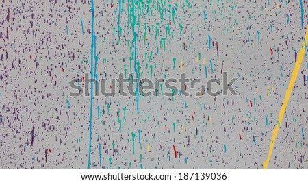 the background texture is multi color red gray green yellow blue gray