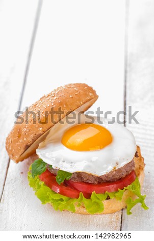 Hamburger with fried eggs