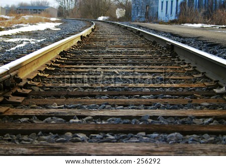 Train tracks running off into the distance.