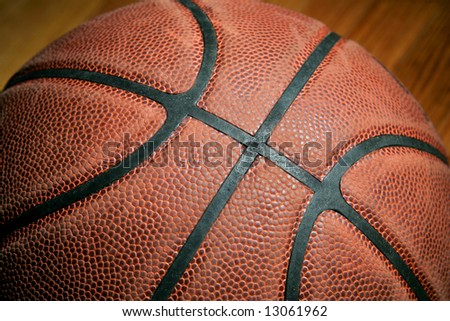 dark low key basketball closeup with leather grain