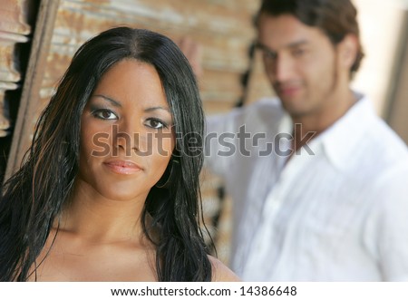 man and woman posing together front and back