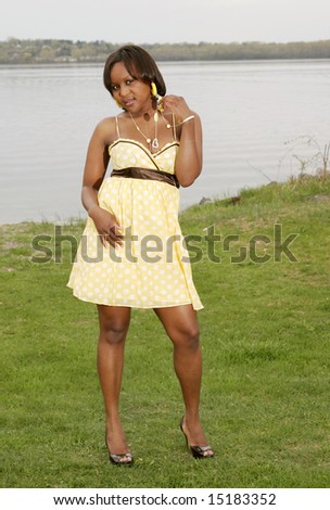 A Young Female From Chad Africa Modeling By The Lake Stock Photo