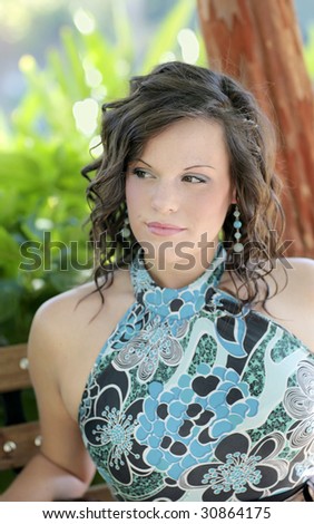 one stunning beautiful twenties brunette woman closeup portrait outdoors