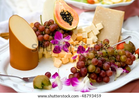 stock photo fruit and cheese platter with grapes at a wedding reception