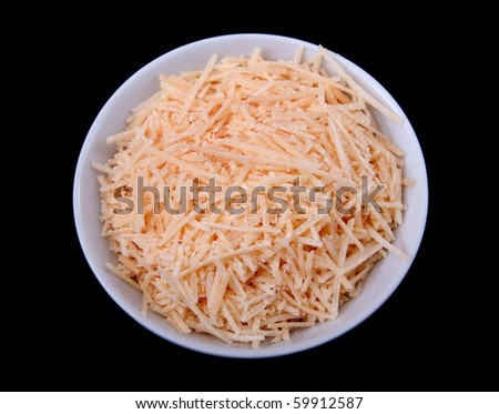 one small white prep bowl full of shredded cheese ready to cook