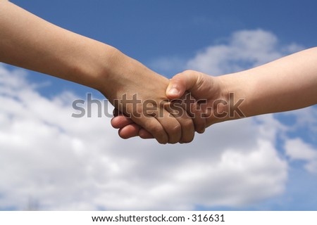 friendship hands pictures. children shake hands as a