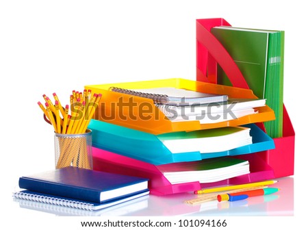 bright paper trays and stationery isolated on white