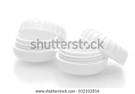 containers for contact lenses isolated on white
