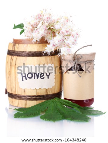 a barrel and a jar of honey and chestnut flowers isolated on white background