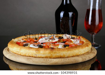 Aromatic pizza and wine isolated on black