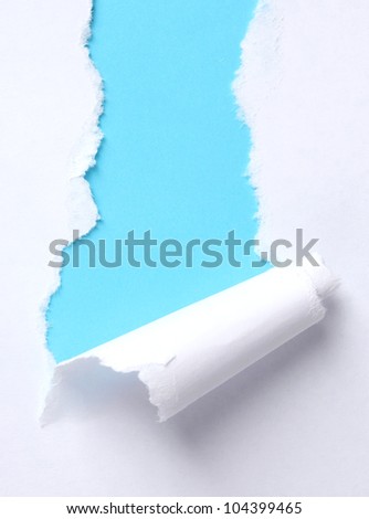 Torn paper  with blue background
