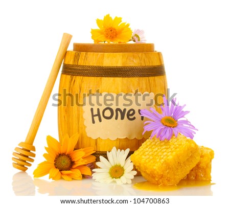 Sweet honey in barrel with honeycomb, wooden drizzler and flowers isolated on white