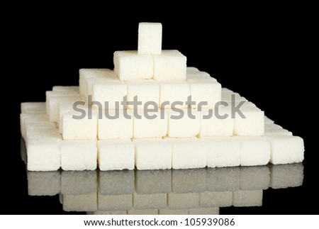 refined sugar isolated on black close-up