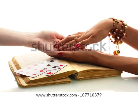 reading the lines hand in a woman\'s hands isolated on white
