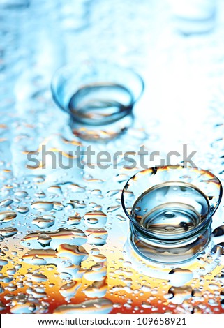 contact lenses, on blue background