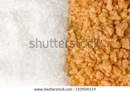 White sugar and brown sugar background closeup