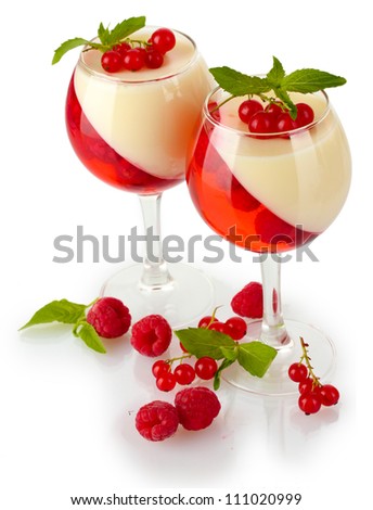 fruit jelly with chocolate and berries in glasses isolated on white