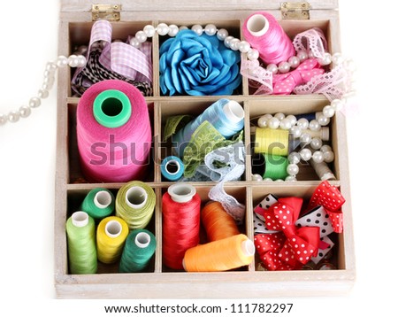 thread and material for handicrafts in box isolated on white