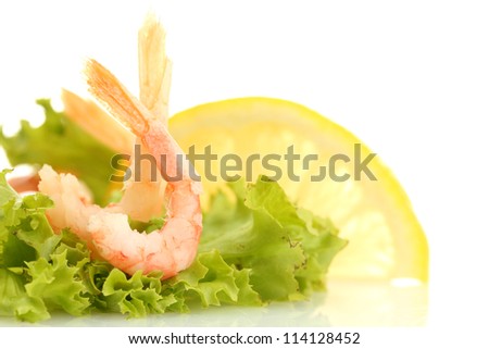 Boiled shrimps, lettuce leaf and lemon, isolated on white