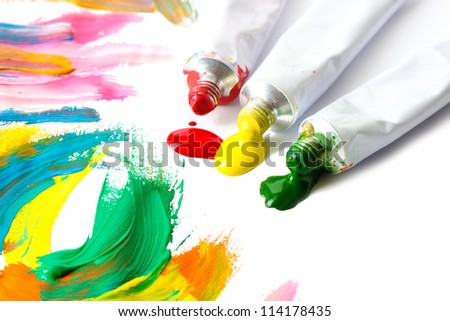 Abstract acrylic paint and paint tubes isolated on white