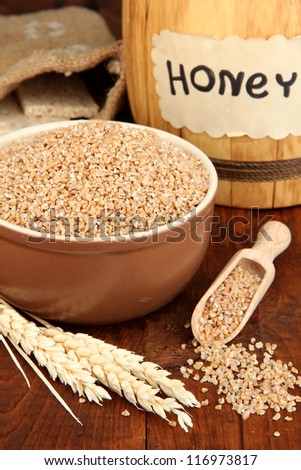 Wheat bran with honey on the table
