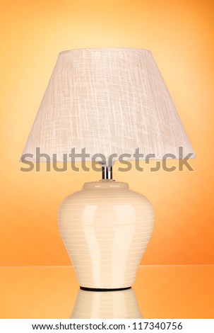 table lamp on orange background