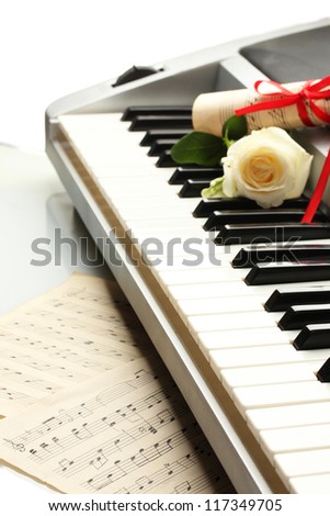 background of piano keyboard with flower