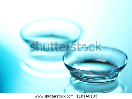 contact lens on blue background