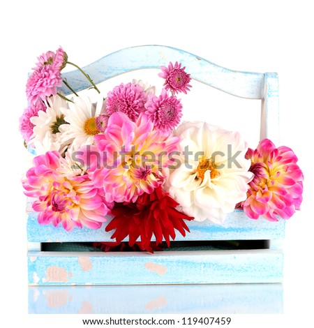 Flowers in wooden box isolated on white