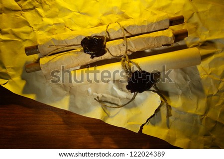 Old scrolls, on brown paper background