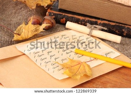 autumn background:romantic letter and leaves