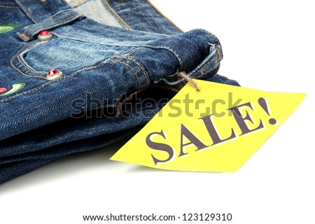 Fashion blue jeans on sale close-up isolated on white
