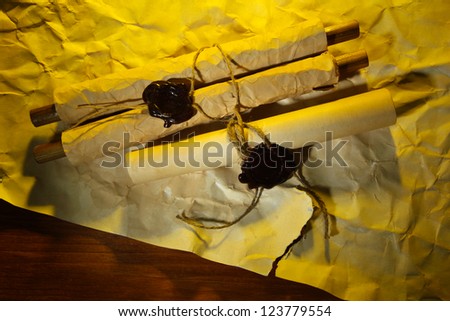 Old scrolls, on brown paper background