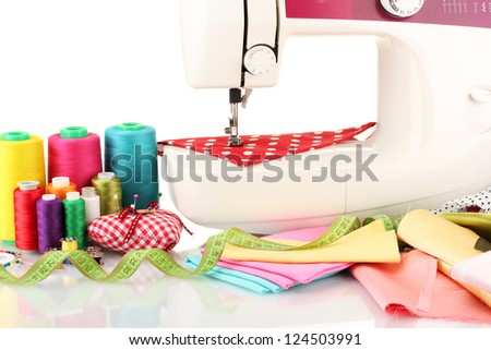 sewing machine and fabric isolated on white