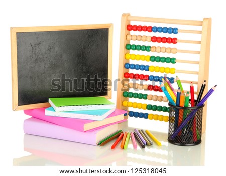 Toy abacus, school desk, books and pencils, isolated on white
