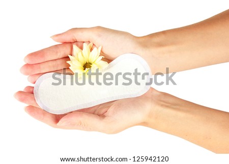 woman\'s hands holding a daily sanitary pad on white background close-up