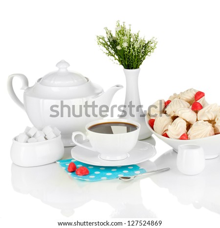 Beautiful white dinner service with an air meringues isolated on white