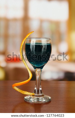 Tasty color liquor, on bright background