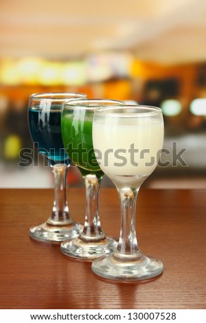 Tasty color liquors, on bright background