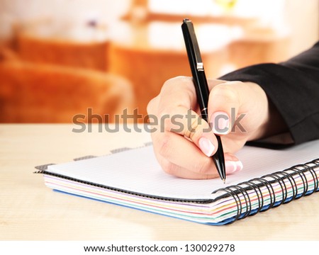 Hand write on notebook, on bright background